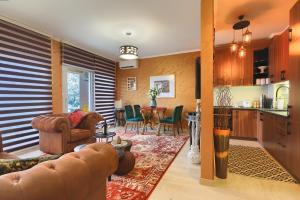 a living room with a couch and a table at Apartment Per Te in Kotor