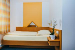 Postel nebo postele na pokoji v ubytování Hotel Central