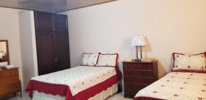 Postel nebo postele na pokoji v ubytování B&D Lodgings