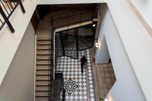 an overhead view of a staircase in a building at Capsis Bristol Boutique Hotel in Thessaloniki