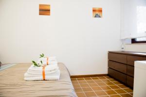 Posteľ alebo postele v izbe v ubytovaní Casa Vela Bianca Mondello Addaura