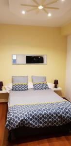 Ένα ή περισσότερα κρεβάτια σε δωμάτιο στο location saisonnière
