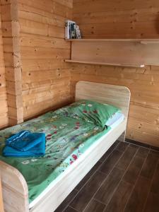 Säng eller sängar i ett rum på Ferienhaus Blick Hasserode