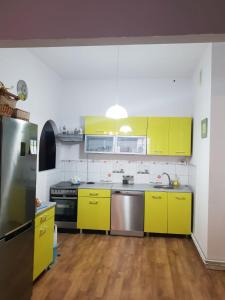 Kuchyň nebo kuchyňský kout v ubytování Apartament Danusia