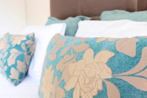 Cama ou camas em um quarto em Graça Apartment