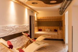 Postel nebo postele na pokoji v ubytování Genusshotel Almrausch