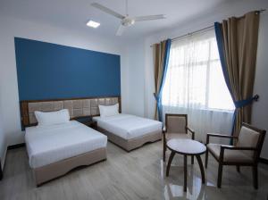 Postel nebo postele na pokoji v ubytování Home Station Hotel + 35 fotografií