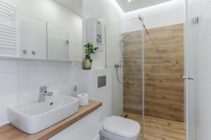 Kúpeľňa v ubytovaní Central Apartments Piwna + 24 fotografií