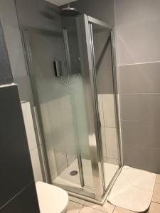 Koupelna v ubytování Hôtel Les Frangins
