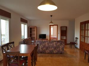 a living room with a table and a couch at Catalejo 5 Aguilas,Murcia in Águilas +14 photos