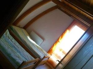 Posteľ alebo postele v izbe v ubytovaní Gitta Nyaralohaz