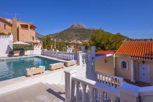 a view of a house with a swimming pool at Villa Jazmin in Calpe