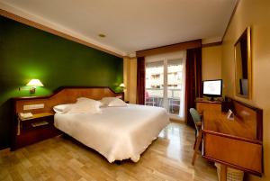 Posteľ alebo postele v izbe v ubytovaní Hotel Torrepalma