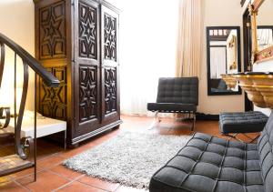 Posezení v ubytování Hotel Herencia By Hosting House