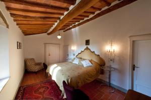 Posteľ alebo postele v izbe v ubytovaní Villa Vittoria Tuscany new opening 2025 + 37 fotografií