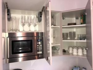 A kitchen or kitchenette at Grossglockner Chalets Zell am See