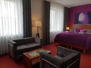 Postel nebo postele na pokoji v ubytování Hotel Color