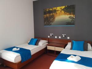 Postel nebo postele na pokoji v ubytování Hotel Color