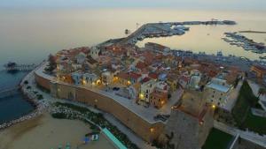 an aerial view of a town next to the water at Malo' Rooms in Termoli