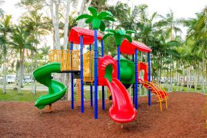 a playground with a slide in a park at Ingenia Holidays Noosa North in Tewantin