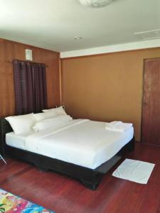 Кровать или кровати в номере Bang Hon Homestay