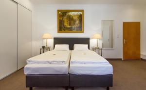 Postel nebo postele na pokoji v ubytování Hotel Adler