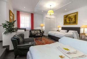 Postel nebo postele na pokoji v ubytování Hotel Adler