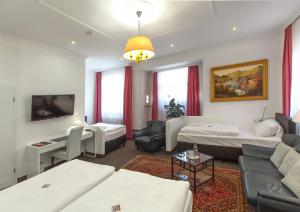Postel nebo postele na pokoji v ubytování Hotel Adler