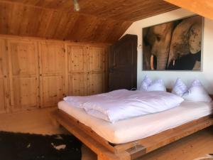 Postel nebo postele na pokoji v ubytování Schatzl Hütte