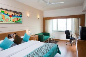 Katil atau katil-katil dalam bilik di Lemon Tree Hotel, Ahmedabad