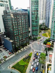 an aerial view of a busy city street with cars at Forbes Area BGC Taguig Manila in Manila