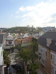 a view of a city with houses at Blue Sky Homestay in Da Lat +50 photos