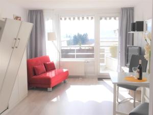 TV a/nebo společenská místnost v ubytování Appartement Allgäu-Sonne mit Sauna und Pool
