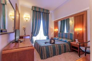 Posezení v ubytování Raeli Hotel Lazio