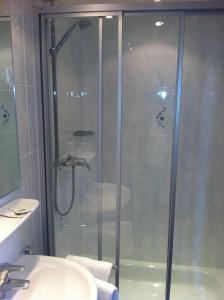 Een badkamer bij Hotel De Beukelaer