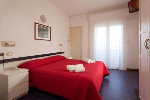 Postel nebo postele na pokoji v ubytování Hotel Panoramic