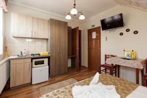 Kuchyňa alebo kuchynka v ubytovaní Almafa Apartmanház