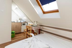 Kuchyňa alebo kuchynka v ubytovaní Almafa Apartmanház