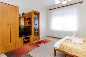 Posteľ alebo postele v izbe v ubytovaní Almafa Apartmanház