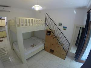 Posteľ alebo postele v izbe v ubytovaní Mirto Apartments