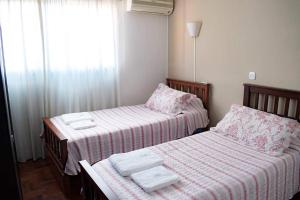 מיטה או מיטות בחדר ב-AMPLIO DEPARTAMENTO -EXCELENTE UBICACION- CON COCHERA