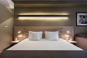 Postel nebo postele na pokoji v ubytování Azur Hotel by ST Hotels + 27 fotografií