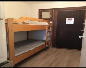 Postel nebo postele na pokoji v ubytování Résidence Les Pélerins