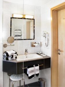 Ein Badezimmer in der Unterkunft Fellhornhaus Ferienwohnungen