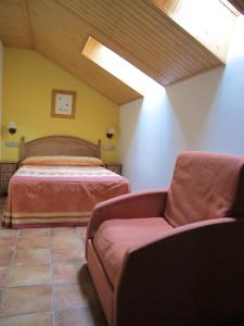 מיטה או מיטות בחדר ב-Apartamentos Casa Español