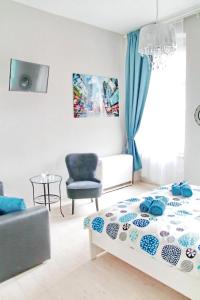 TV a/nebo společenská místnost v ubytování Grey Rooms + 37 fotografií