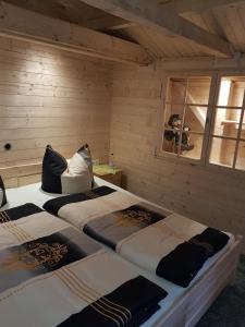 Кровать или кровати в номере Home&Classic Erlebnisscheune