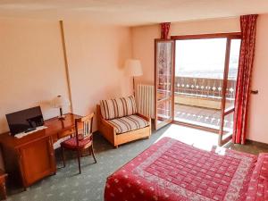 Postel nebo postele na pokoji v ubytování Hotel Panoramique