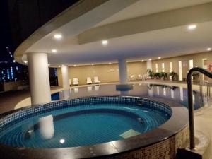 The swimming pool at or close to Selamat Datang @ 118 Island Plaza Superior Suite