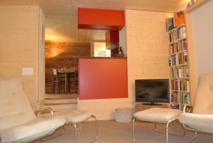 Area soggiorno di Ferienwohnung Troegligasse